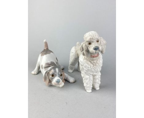 LLADRO FIGURE OF A POODLE, 15cm high, along with another Lladro dog, Lladro swan with signets and a Nao figure group
