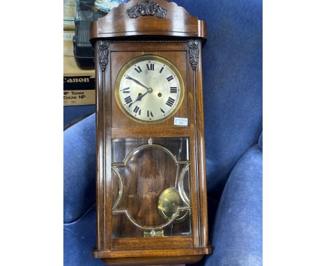 MODERN WALL CLOCK, along with an oval wall mirror (2)