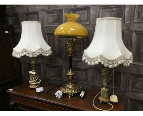 PAIR OF ONYX AND BRASS TABLE LAMPS, with shades, along with a brass table lamp with opaque glass shade (3)