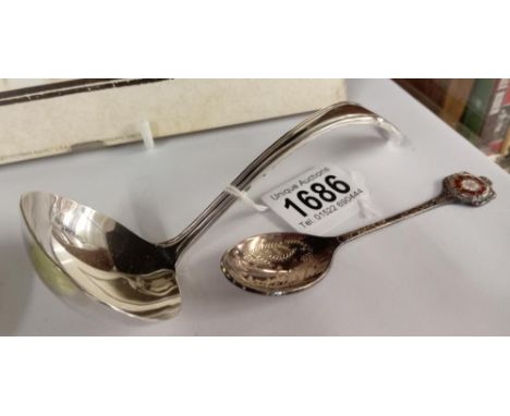 A silver plated soup ladle &amp; an enamel rose silver plate teaspoon