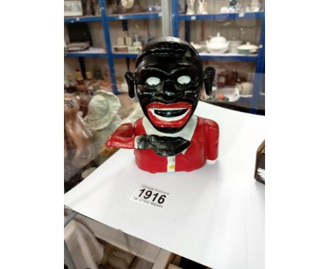 A vintage style money box Notice from the the-saleroom.com: These items are listed on the basis they are illustrative of a by