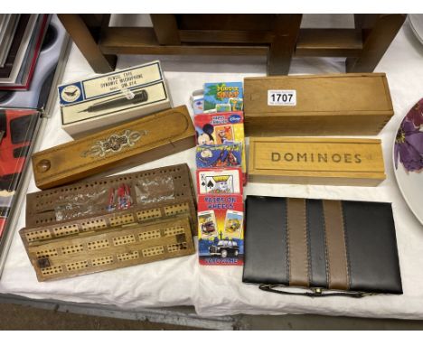 A mixed lot including crib boards, dominoes, pencil boxes, playing cards etc.