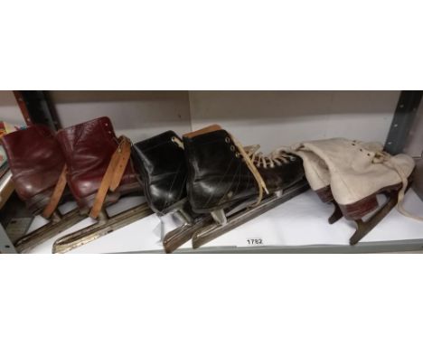 3 pairs of vintage ice skates
