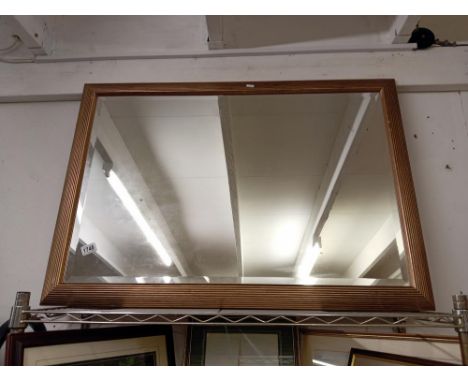 A large gilt framed bevel edged mirror. COLLECT ONLY.