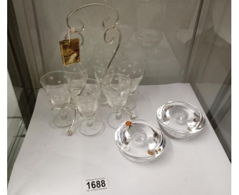 A pair of Orrefors candle holders &amp; a set of 6 vintage glasses on a silver plated stand
