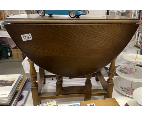 A small oak gate leg table. COLLECT ONLY.