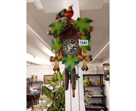 A cuckoo clock COLLECT ONLYThis is a modern clock the bellows operate when artificially activated