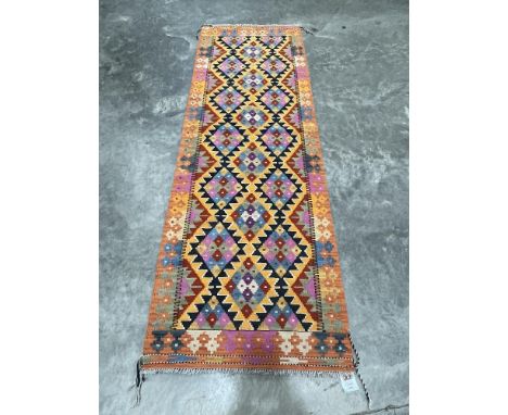 A Choli Kilim carpet runner. 2.47m x 0.83m