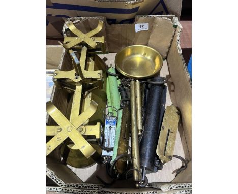 A box of spring balances with a set of weighing scales