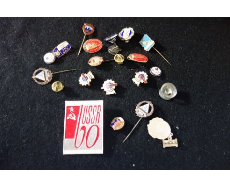 A COLLECTION OF RUSSIAN SOVIET ERA COMMUNIST ENAMEL BADGES AND PINS, and other badges