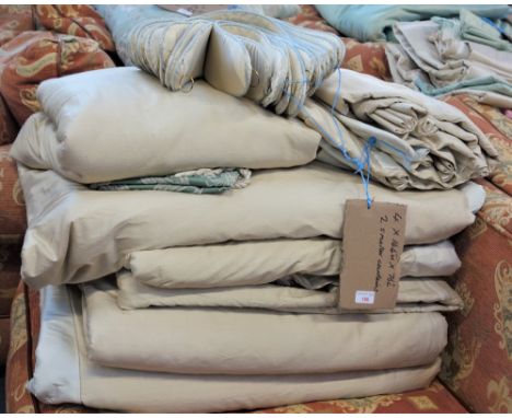 A SUITE OF FOUR IVORY SILK LINED CURTAINS, each 193cm drop x 366cm wide and two smaller