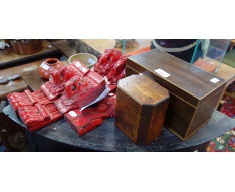 A 19TH CENTURY MAHOGANY AND BOX WOOD TEA CADDY, the hinged cover to reveal a fitted interior with turned ivory knop finials a