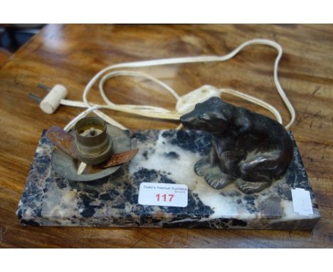 AN ART DECO DESK LAMP modelled with a plated model of a seated polar bear on a polished marble rectangular base