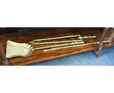 A SET OF VICTORIAN BRASS FIRE TOOLS