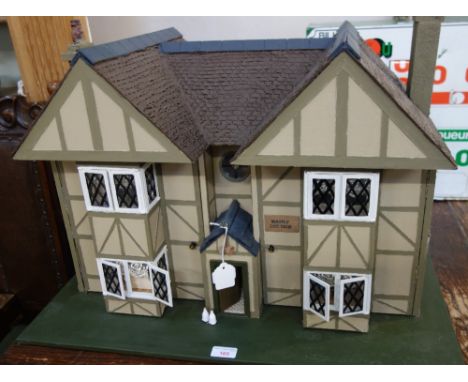 A RESTORED VINTAGE "TUDOR" STYLE DOLLS HOUSE fully furnished ; 'Mayfly Cottage'