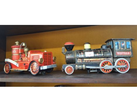 A TRADEMARK MODERN TOYS JAPANESE TINPLATE MODEL OF A WESTERN STEAM LOCOMOTIVE, pattern no. 557116,701170,24962, and a Tradema