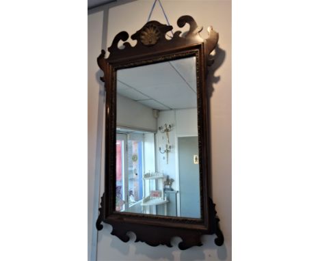 A GEORGE III STYLE MAHOGANY FRAMED WALL MIRROR, 48cm wide 