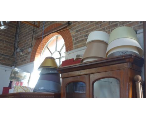 A LARGE COLLECTION OF LAMP SHADES, of various forms and colours 