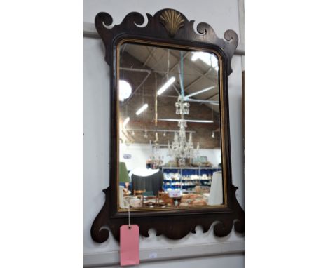 A GEORGE III STYLE MAHOGANY FRAMED WALL MIRROR, 53cm wide