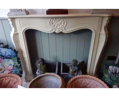 A LOUIS XV STYLE WOODEN FIRE SURROUND, painted with marble hearth, shelf 139cm wide