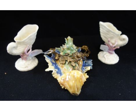 A PAIR OF "BELLEEK" STYLE SHELL VASES and a 19th century ceramic wall pocket with a gilt metal mount