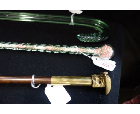 A VICTORIAN STYLE NAILSEA WALKING CANE, the twist cane filled with coloured beads, another Nailsea walking stick and a Veneti