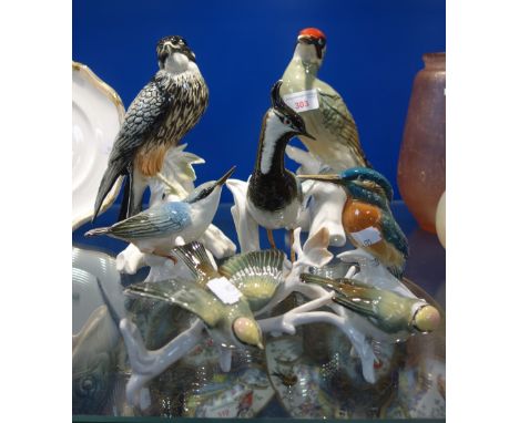 KARL ENS; A LARGE CERAMIC WOODPECKER and a collection of similar ceramic birds (6)