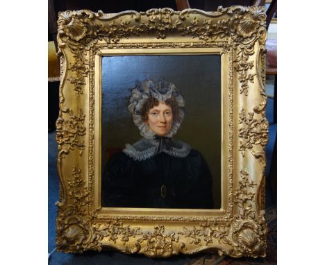 JULIE PHILIPAULT (1780-1834) Portrait of a lady wearing a black dress, lace bonnet and collar, half length, signed above the 