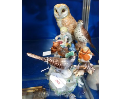 A ROYAL WORCESTER FIGURE, "LITTLE JACK HORNER" and a collection of Beswick, Goebel and similar ceramic birds