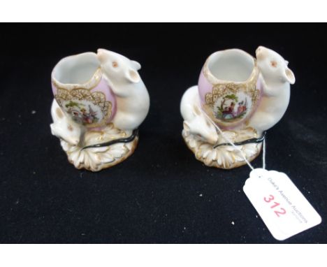 A PAIR OF 19TH CENTURY CONTINENTAL CERAMIC POTS decorated with mice, 7.5cm high