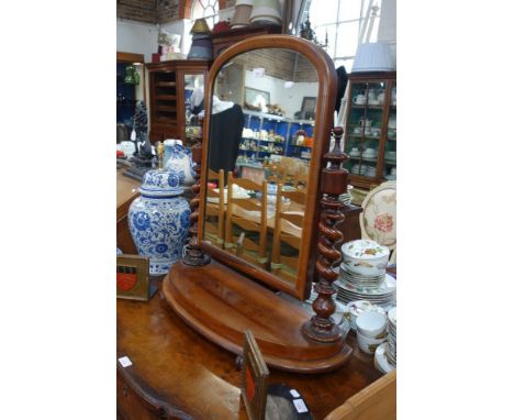 A VICTORIAN MAHOGANY DRESSING TABLE MIRROR with barley twist supports