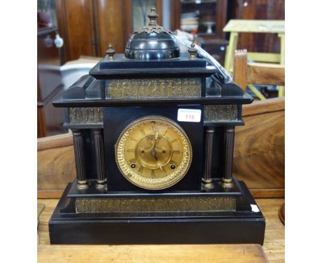 A 19TH CENTURY SLATE ARCHITECTURAL MANTEL CLOCK with four columns, with a frieze of figures, circular gilt dial with Roman nu