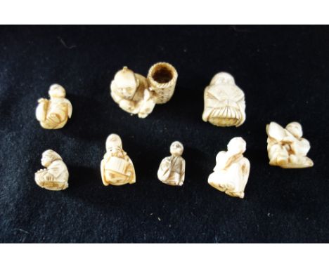 EIGHT CARVED IVORY NETSUKE, MEIJI