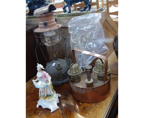 A EARLY 20TH CENTURY SMOKELESS BEACONLITE, a copper paraffin lamp and a late 19th Century painted figure 