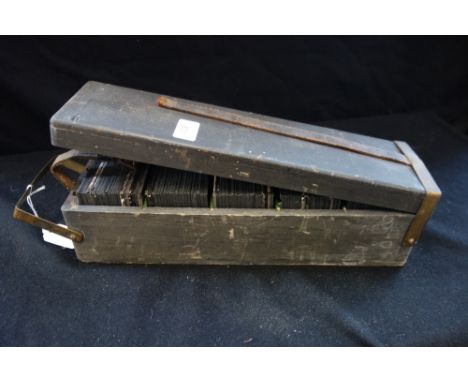 A COLLECTION OF EARLY 20TH CENTURY GLASS MAGIC LANTERN SLIDES to include views of the Vatican, in a fitted box