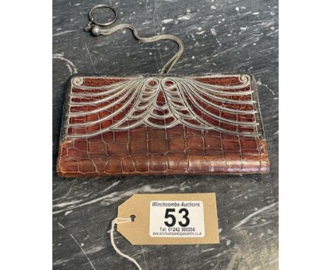 An art nouveau leather and silver purse. Dated London 1908