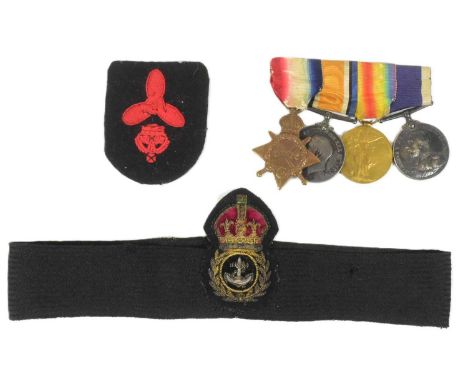 A WWI First World War medal group including a Naval Long Service and Good Conduct Medal awarded to one K.11467 H. Willis Safe