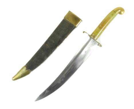 An early 20th Century Indo Persian Jambiya / Khanjar dagger with a jade type hilt, brass crossguard and a curved blade with s