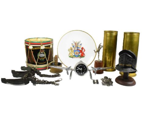 A collection of assorted Militaria to include; x2 WWI First World War 1917 dated trench art shells, alluminium desk clock in 
