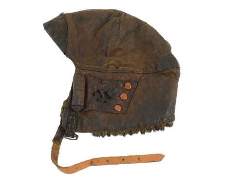 A WWI First World War British RFC Royal Flying Corps leather flying helmet MK1. Brown leather exterior with fur and shamois l