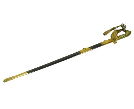 An original 1827 Pattern Royal Navy Officers sword. Lion head pommel and back strap, rayskin grip with wire banding, bowl sha