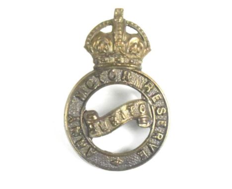 A WWI First World War British Army Motor Reserve cap badge as worn by a driver from a wealthy family who would have donated t