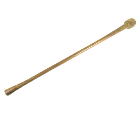 An early 20th Century African club / knobkerrie with a dome shaped head and tapering shaft. Measures approx 73cm.
