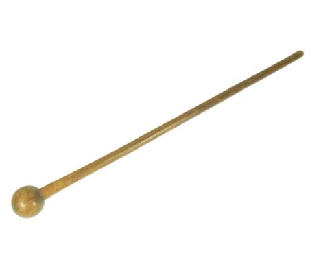 A vintage South African Zulu Knobkerrie with a spherical head and a slender wooden shaft. Measures approx 74cm.