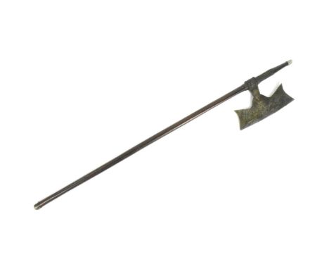 An early 20th Century Indian tribal Bulova / Bullova axe from Chota Nagpur. Inverted crescent shaped head mounted to the wood