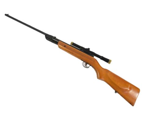A vintage 1970s Hungarian made .22 calibre break barrel air rifle with Relum 4x15 scope. Mechanism cocks and fires. Serial nu