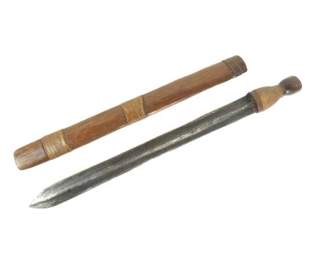 Southern African Zimbabwe Shona People Bakatwa dagger. Fluted pommel with carved details, animal hide collar and a long blade