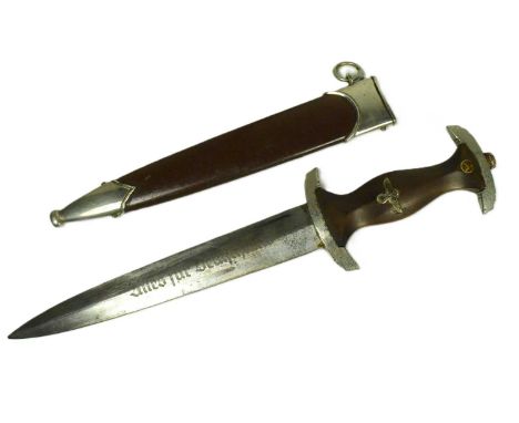 A WWII Second World War Third Reich Nazi German SA Officers dress dagger. The dagger having a shaped wooden grip with inset S