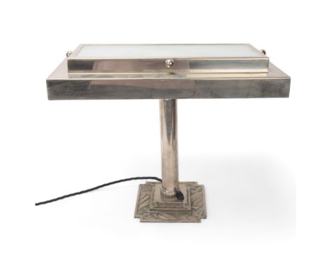 An art deco silver-plated desk lamp, with frosted glass top to shade, height 33cm, length 40cmGood condition, some rubbing to