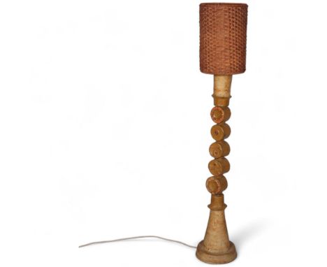 BERNARD ROOKE (b1938), A large brutalist ceramic floor lamp, a round joined totem body, with rattan shade, height of lamp bas